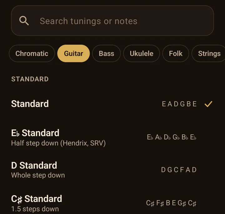 The Tunings sheet: a search field for tunings or notes, family chips Chromatic, Guitar, Bass, Ukulele, Folk and Strings with Guitar selected, and under Standard the Standard tuning EADGBE ticked above E flat Standard, D Standard and C sharp Standard
